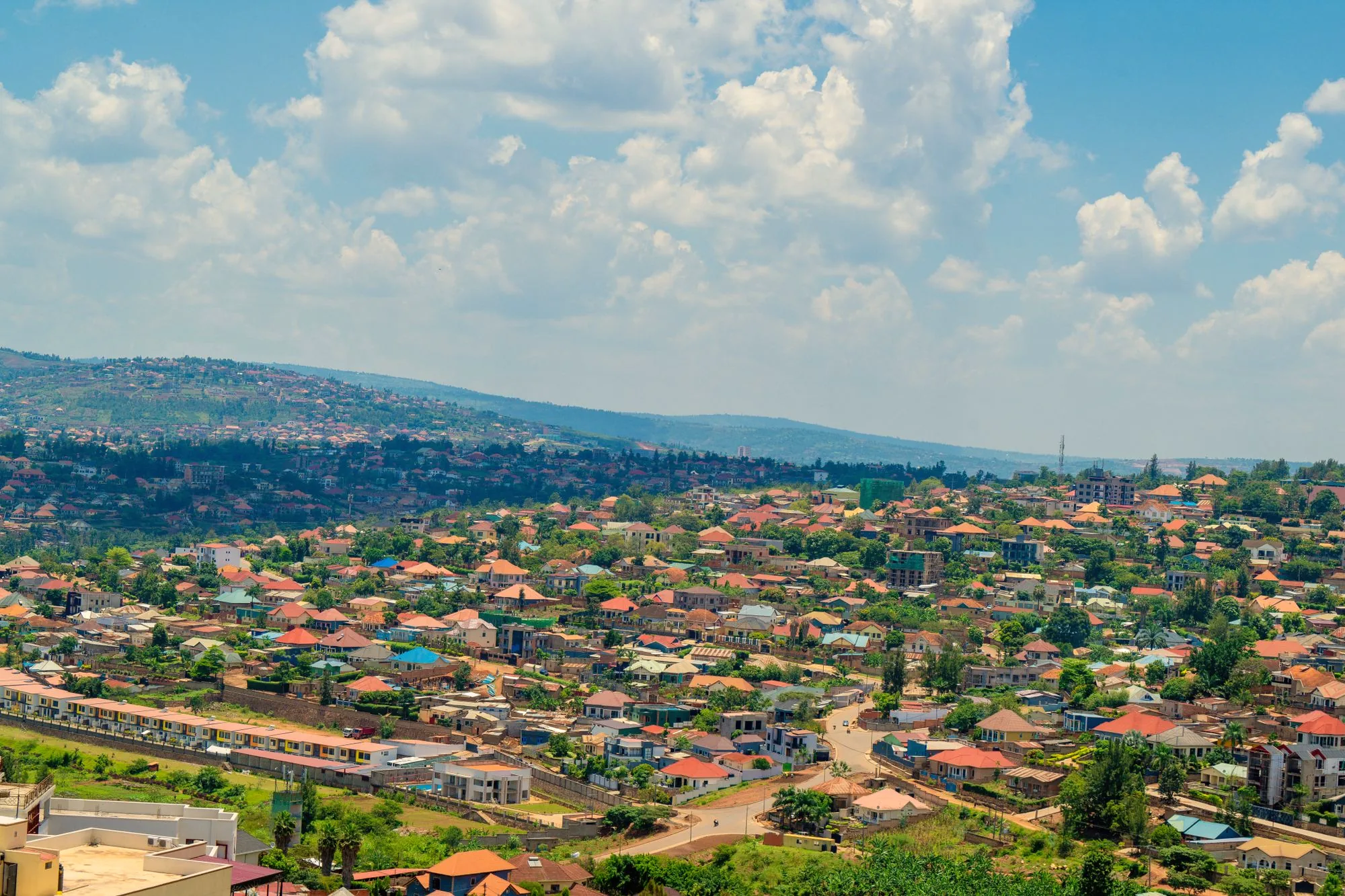 Aerial view of Kigali rooftops and greenery