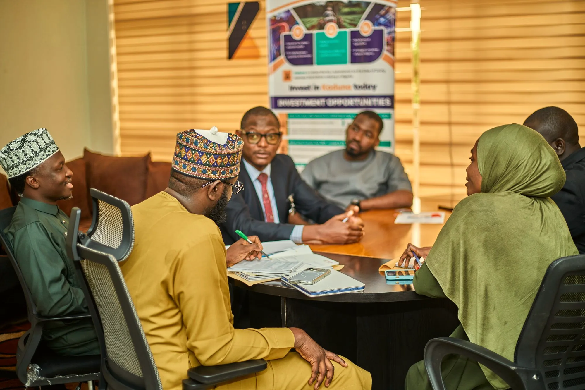 African business team in a meeting around a conference table